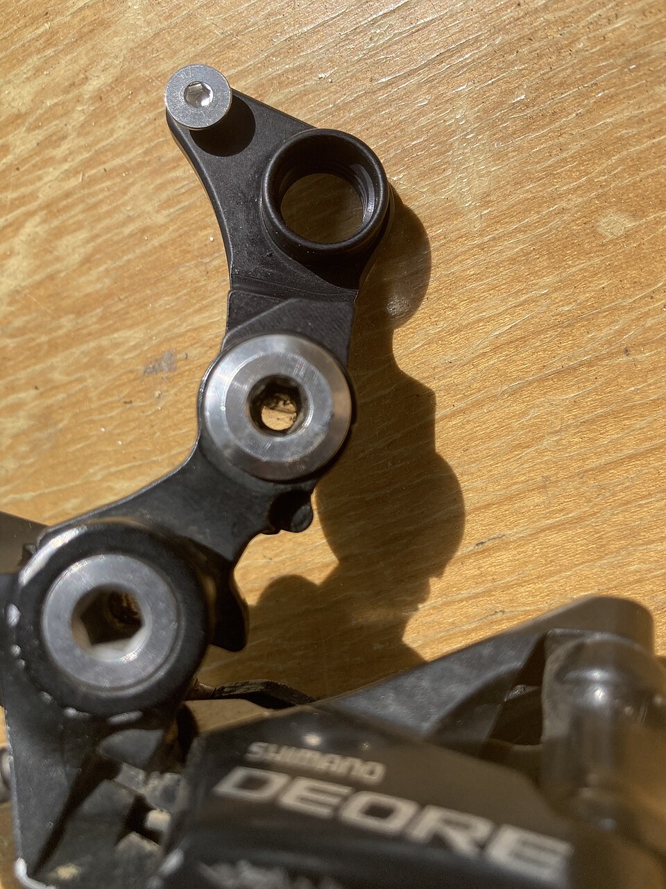 A derailleur hanger: the small metal part that connects the rear derailleur to the frame